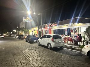 From street  at Pupusería La Ceiba in Santa Ana