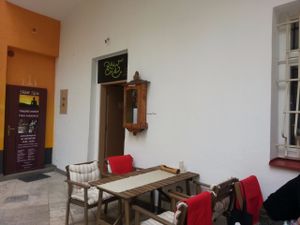 Outside seating area and entrance at Rawcha in Prague