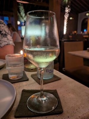 Chilled white wine  at Muda By/Suka in Canggu