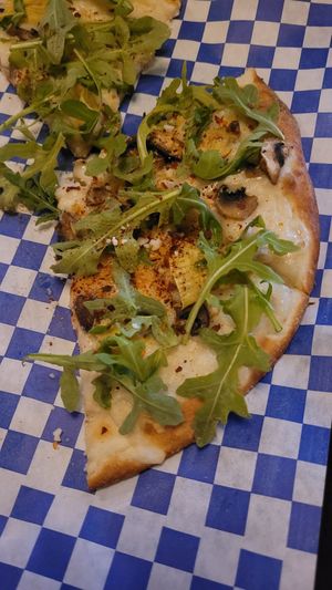 Rockies Favorite with red pepper and vegan parmesean at The Pizza Bar in Denver