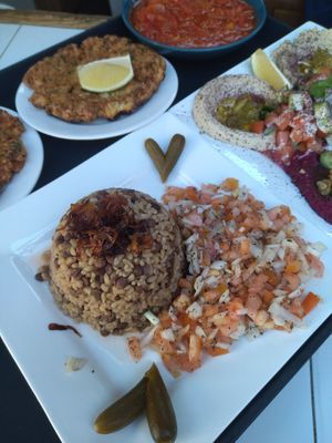 Mujadara, a jordanian traditional dish at Hommosani - الحمصاني  in Amman