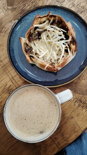 Quish de verduras y cafecito, todo vegan at Mixta Cafe in Santiago