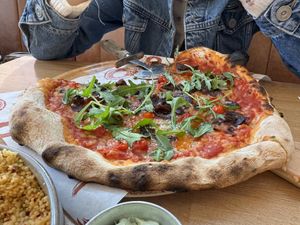Vegan pizza with rocket, caramelised onion and roquito peppers  at Orto - Bedford House in Belfast