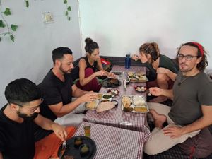 Customers having vegan food at Rama Cafe in Rishikesh