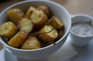 Roasted potatoes. at Cafe Pinson - Poissonniere in Paris
