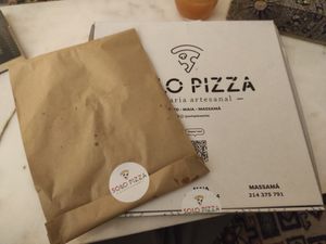 Pizza and garlic bread at  Solo Pizza in Maia