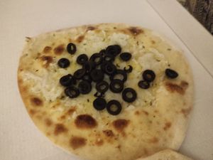 Garlic and olives bread at  Solo Pizza in Maia