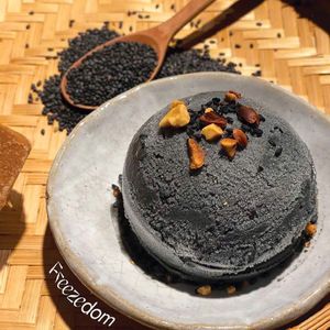 Black Sesame Gelato

Black sesame, coconut milk, Noom jaggery, ginger, serve with coconut meat and roasted peanuts on top at Freezedom Da Nang in Da Nang