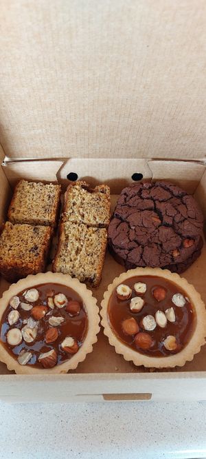 Huge selection of treats. We also loved the scones with cream and jam, plus stacked meringues at All Good Things Vegan in Paignton