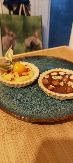 Lemon curd tart and a Toffee & hazelnut tart at All Good Things Vegan in Paignton