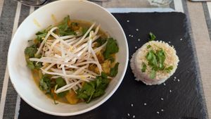 Thai yellow curry with vegetables and tofu, served with jasmine rice and bean sprouts (main) at All Good Things Vegan in Paignton