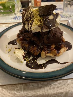 Belgian waffle, home made chocolate ice cream, pistachioo  at All Good Things Vegan in Paignton