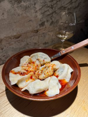 Dumplings with Chilli Oil - Cabbage/ Woodear mushroom/ Peanut at chaochao. vegan food and natural wine bar in Beijing