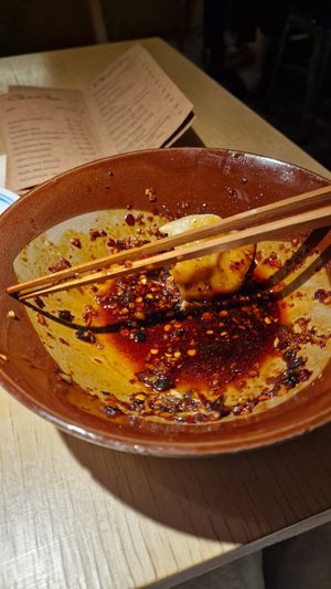 Has been "Dumplings with Chili Oil" at chaochao. vegan food and natural wine bar in Beijing