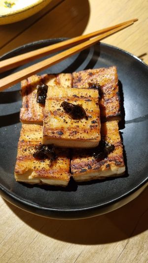 Miso Tofu: To be honest, I found it a bit bland for my taste. I ended up mixing it with the leftover sauce from the Xiang Xiang tofu, and then it was delicious. at chaochao. vegan food and natural wine bar in Beijing