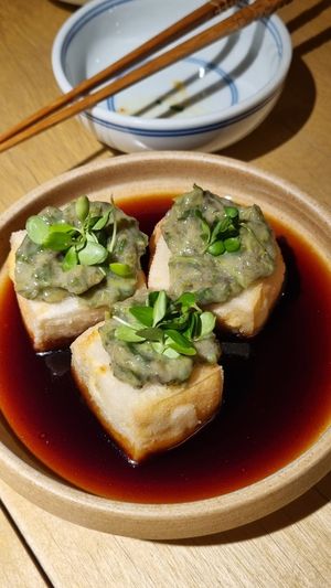 Xiang Xiang Crispy Tofu Cubes: Absolute perfection—crispy on the outside, soft on the inside, with an amazing sauce and seasoning at chaochao. vegan food and natural wine bar in Beijing