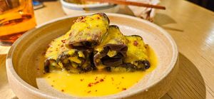 orange aubergine rolls at chaochao. vegan food and natural wine bar in Beijing