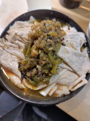 Tofu skins with green peppers at chaochao. vegan food and natural wine bar in Beijing