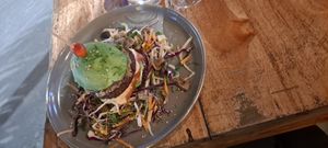 GF burger! Served w avocado. What a great idea!  at Tiki Limbo in Montanita