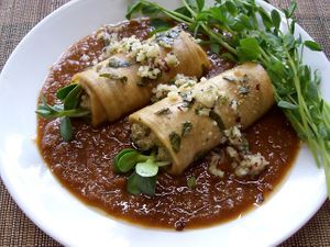 Sunflower seed Italian sausage in marinated eggplant manicotti, marinara sauce at La Joya Del Sol in Perez Zeldon