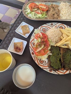 Round plate is special menu and top one is cheaper one at Verde Manantial Veg in Cali