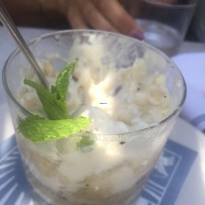 sorry this is half eaten. lemon cashew truffle  at Gracias Madre - WeHo in West Hollywood