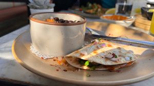 MUSHROOM QUESADILLA 
mozzarella, roasted garlic mushroom, spinach, and guacamole at Gracias Madre - WeHo in West Hollywood