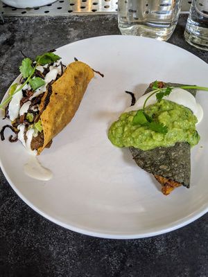 The crispy onion taco on the left is my all-time favorite! at Gracias Madre - WeHo in West Hollywood