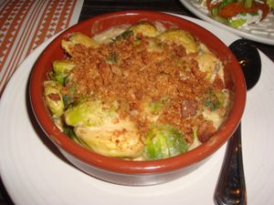 REPOLLITOS CON QUESA FONDIDO
Brussels sprouts and caramelized onions baked in cashew cheese and topped with garlic breadcrumbs at Gracias Madre - WeHo in West Hollywood