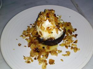 FUDGE BROWNIE - gluten-free brownie, salted Mezcal caramel, coconut bacon, orange cashew whipped cream  at Gracias Madre - WeHo in West Hollywood