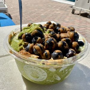 Almond butter drizzle over blueberries, the GF/vegan granola and hemp seeds!  at Playa Bowls in Lauderdale-by-the-sea