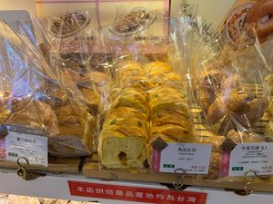 Purple sweet potato bread with yellow sweet potato and mochi, pumpkin bread, small croissants at Ijysheng Nanxi in Taipei