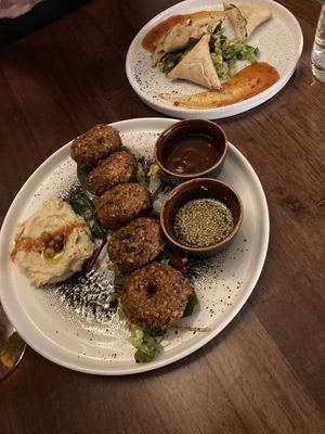 Falafel platter with samosa in background   at Arabic Flavour in Aberystwyth