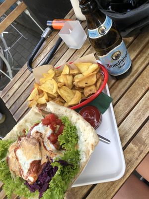 Vöner, fries and a beer  at Vegangster in Rostock