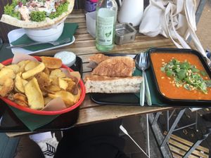 Potato fritters with dip, „butter“ beans in tomato sauce and vöner.  at Vegangster in Rostock