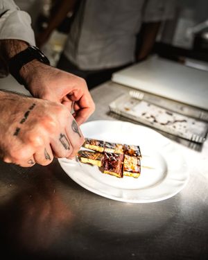 Eggplant skewers, glazed with balsamic vinegar and soy at Bluesquare in Milan