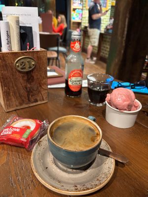 vegan Cherry Bakewell and americano, and raspberry sorbet (two scoops) and Fentimans Cherry Cola at Emporium Stories Feastery in Rotherham