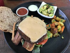 Vegan  cheeseburger with added bacon and avacado  at Green Gallery in Koh Phangan