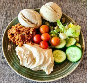 Salad, dips and bread at Majdolin Restaurant in Sharjah