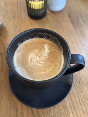 Coffee with oat milk   at House of Greens in Berlin