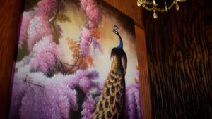 peacock art work, interior at Red Curry Vegan Kitchen in Flagstaff