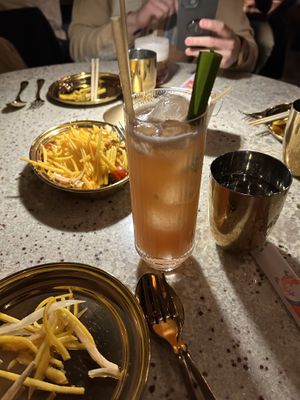 Singaporean cocktail and mango salad  at Laut in New York City