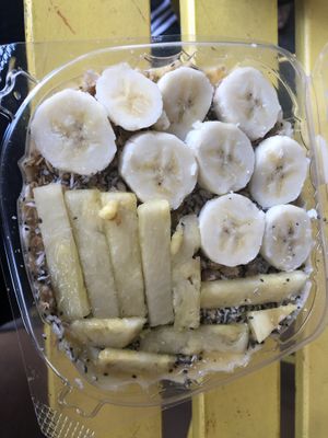 Tropical smoothies bowls- pineapple, banana, orange, mango (no maple syrup, or honey or peanut butter; only shredded coconut and hemp seeds and chia seeds on top )   at Raw Juice Bar in Orlando