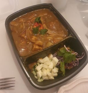 Malaysian curry: rich, fragrant & Spicier curry with potatoes, carrot, red onions with plant based chicken (side salad) at Peppery Rose Alderley Edge in Alderley Edge