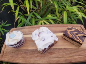Red Velvet Cupcake, Cinnamon Roll, and Snickers Slice at Bel's Vegan Bakes - Pop-Up in Bangor