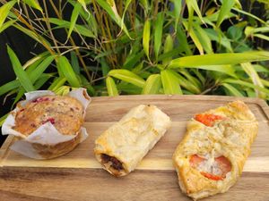 Raspberry and White Chocolate Muffin, 'Sausage' Roll and 
Cheese and Tomato Turnover. at Bel's Vegan Bakes - Pop-Up in Bangor