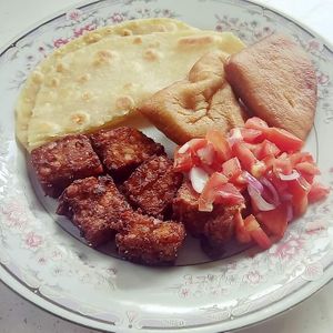 Chapati, Vegan meat, Mahamri and Kachumbari at Giriama Village Lounge in Mombasa