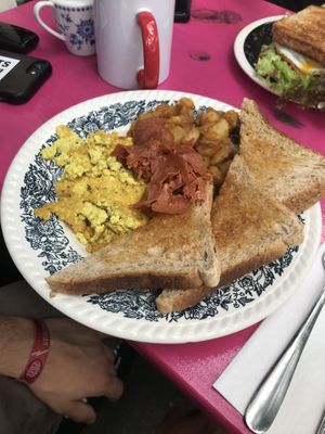 Scrambled tofu with bacon, fried potatoes and toast  at Mamalicious in Hamburg