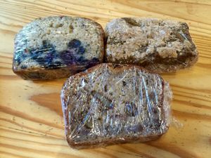 Banana walnut bread, blueberry almond bread, and pumpkin crumble bread.  at The Sentient Bean in Savannah