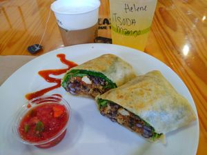 Vegan breakfast burrito, mango Italian soda, and earl grey tea latte with soy milk at The Sentient Bean in Savannah